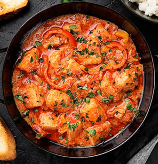 Guiso de pescado con pimiento rojo